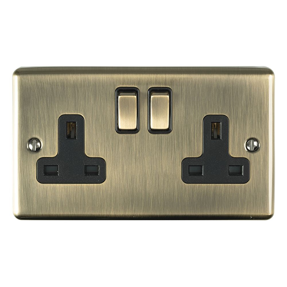 This is an image showing Eurolite Enhance Decorative 2 Gang Socket - Antique Brass (With Black Trim) en2soabb available to order from T.H. Wiggans Ironmongery in Kendal, quick delivery and discounted prices.