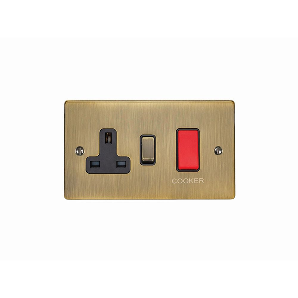 This is an image showing Eurolite Enhance Decorative 45Amp Switch with a socket - Antique Brass (With Black Trim) en45aswasabb available to order from T.H. Wiggans Ironmongery in Kendal, quick delivery and discounted prices.