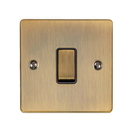 This is an image showing Eurolite Enhance Decorative Intermediate Switch - Antique Brass (With Black Trim) enintabb available to order from T.H. Wiggans Ironmongery in Kendal, quick delivery and discounted prices.
