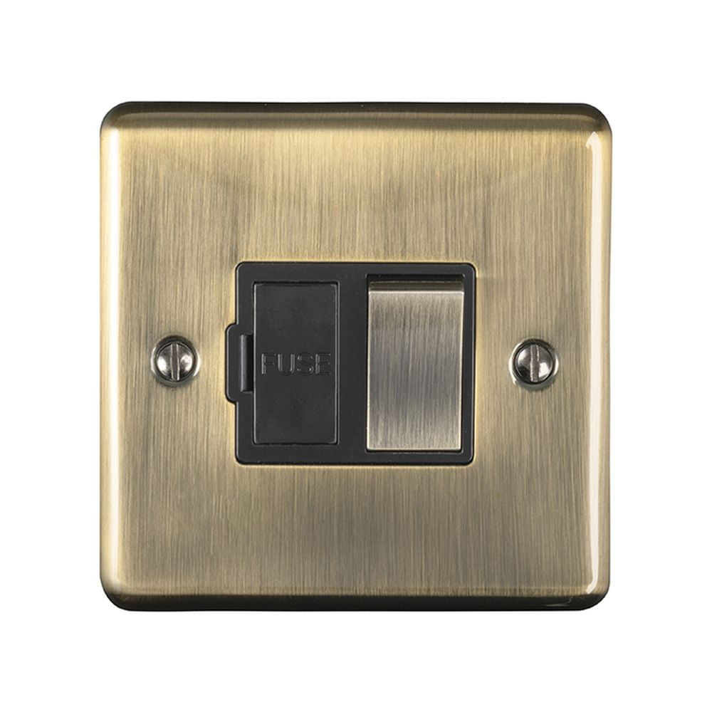 This is an image showing Eurolite Enhance Decorative Switched Fuse Spur - Antique Brass (With Black Trim) enswfabb available to order from T.H. Wiggans Ironmongery in Kendal, quick delivery and discounted prices.