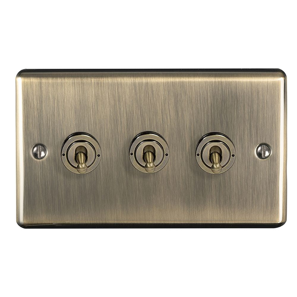 This is an image showing Eurolite Enhance Decorative 3 Gang Toggle Switch - Antique Brass (With Black Trim) ent3swabb available to order from T.H. Wiggans Ironmongery in Kendal, quick delivery and discounted prices.