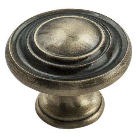 This is an image of a FTD - Traditional Pattern Knob 34mm - Antique Burnished Brass that is availble to order from T.H Wiggans Architectural Ironmongery in Kendal in Kendal.