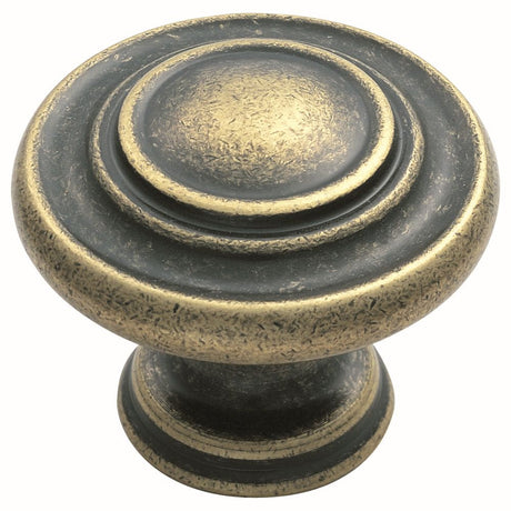 This is an image of a FTD - Traditional Pattern Knob 34mm - Antique Brass that is availble to order from T.H Wiggans Architectural Ironmongery in Kendal in Kendal.