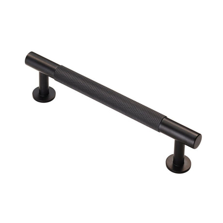 This is an image of a FTD - Knurled Pull Handle 128mm c/c - Matt Black that is availble to order from T.H Wiggans Architectural Ironmongery in Kendal in Kendal.