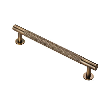 This is an image of a FTD - Knurled Pull Handle 160mm c/c - Antique Brass that is availble to order from T.H Wiggans Architectural Ironmongery in Kendal in Kendal.