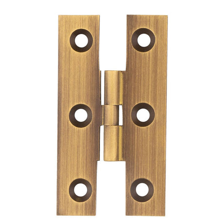 This is an image of a FTD - H Pattern Hinge - Antique Brass that is availble to order from T.H Wiggans Architectural Ironmongery in in Kendal.