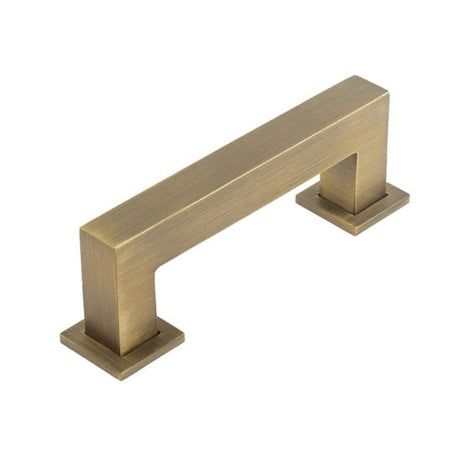 This is an image of a Burlington - Trafalgar Cabinet Handle 96mm CTC - Antique Brass that is availble to order from T.H Wiggans Architectural Ironmongery in Kendal in Kendal.