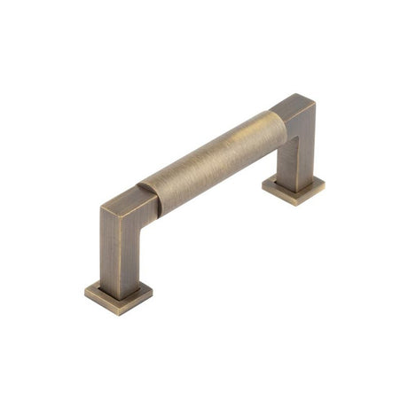 This is an image of a Burlington - Westminster Cabinet Handle 96mm CTC - Antique Brass that is availble to order from T.H Wiggans Architectural Ironmongery in Kendal in Kendal.