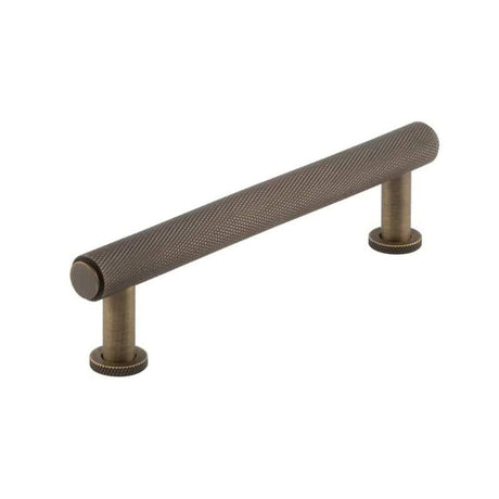 This is an image of a Burlington - Piccadilly Cabinet Handle 128mm CTC - Antique Brass that is availble to order from T.H Wiggans Architectural Ironmongery in Kendal in Kendal.