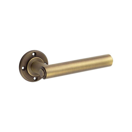 This is an image of Burlington - Richmond Antique Brass Lever on Rose Door Handle - Roses Sold Separ available to order from T.H Wiggans Architectural Ironmongery in Kendal, quick delivery and discounted prices.