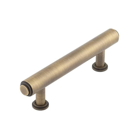 This is an image of a Burlington - Belgrave Cabinet Handle 96mm CTC - Antique Brass that is availble to order from T.H Wiggans Architectural Ironmongery in Kendal in Kendal.