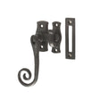 This is an image of a Frelan - Monkey Tail Locking Casement Fastener Left - Antique Black that is availble to order from T.H Wiggans Architectural Ironmongery in Kendal in Kendal.