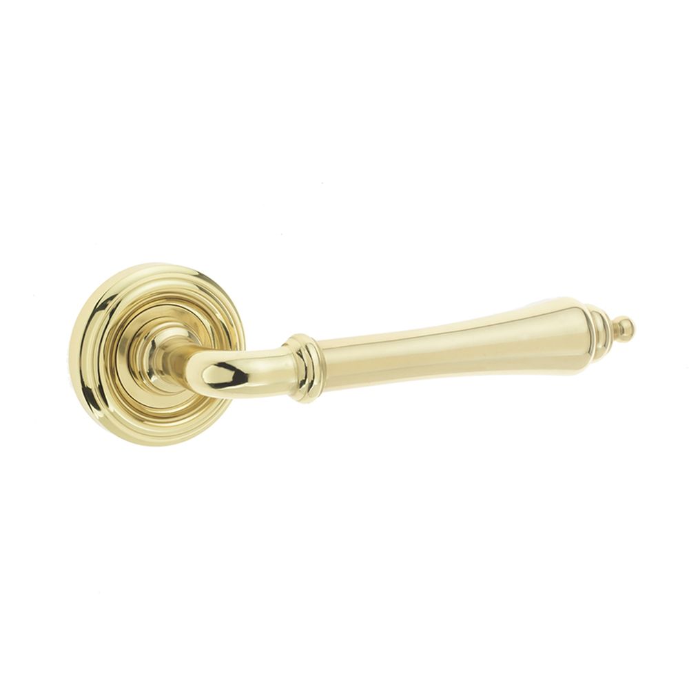 This is an image showing the Frelan - Camille Levers on Round Rose - Polished Brass available to order from T.H. Wiggans Ironmongery in Kendal
