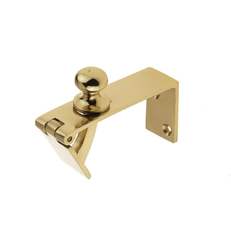 This is an image of a Frelan - Counter Flap Catch - Polished Brass that is availble to order from T.H Wiggans Architectural Ironmongery in in Kendal.