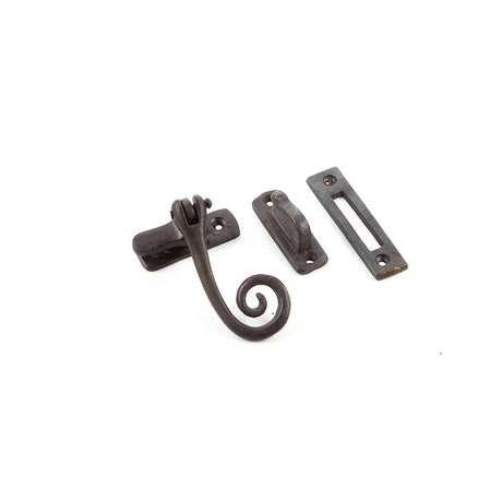 This is an image of a Frelan - Valley Forge Curly Tail Casement Fastener - Beeswax that is availble to order from T.H Wiggans Architectural Ironmongery in Kendal in Kendal.