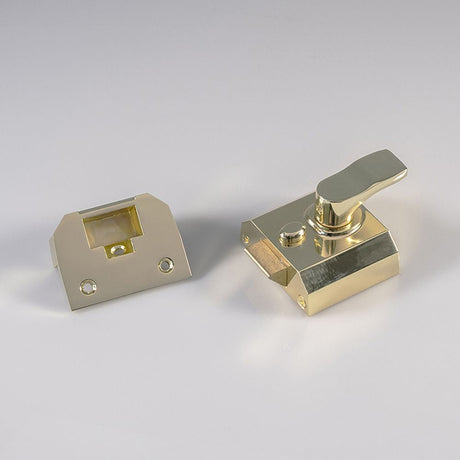 This is an image of a Eurospec - Contract Rim Cylinder Nightlatch 40mm - Electro Brassed that is availble to order from T.H Wiggans Architectural Ironmongery in Kendal.