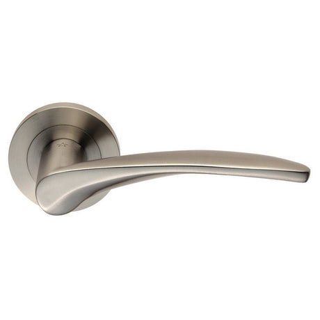 This is an image of Eurospec - Steelworx SWL Tirolo Lever on Rose - Satin Stainless Steel available to order from T.H Wiggans Architectural Ironmongery in Kendal, quick delivery and discounted prices.