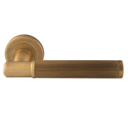 This is an image of Serozzetta - Image Lines Lever On rose - Antique Brass available to order from T.H Wiggans Architectural Ironmongery in Kendal, quick delivery and discounted prices.