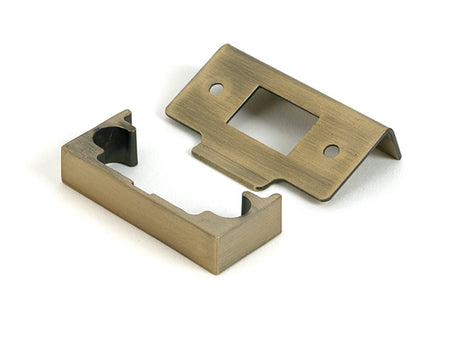 This is an image of From The Anvil - Aged Brass Â½" Rebate Kit for Tubular Mortice Latch available to order from T.H. Wiggans Ironmongery in Kendal.