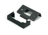 This is an image of From The Anvil - Aged Bronze Â½" Rebate Kit for Tubular Mortice Latch available to order from T.H. Wiggans Ironmongery in Kendal.