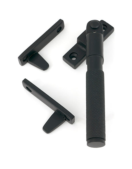 This is an image of From The Anvil - Matt Black Night-Vent Locking Brompton Fastener available to order from T.H. Wiggans Ironmongery in Kendal.