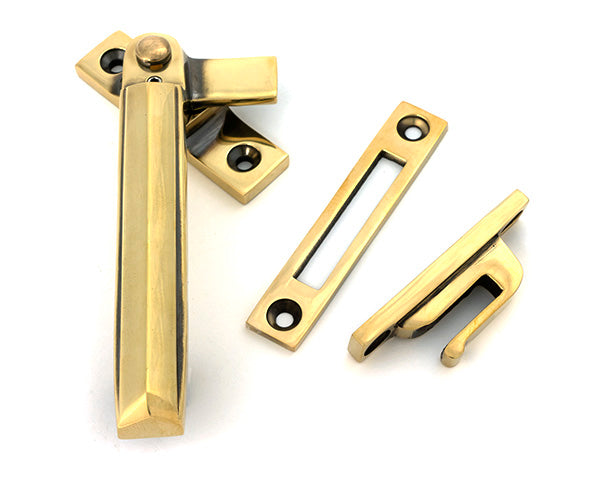 This is an image of From The Anvil - Aged Brass Locking Art Deco Fastener - LH available to order from T.H. Wiggans Ironmongery in Kendal.