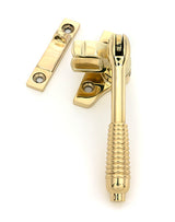 This is an image of From The Anvil - Polished Brass Night-Vent Locking Reeded Fastener (Steel Window) available to order from T.H. Wiggans Ironmongery in Kendal.