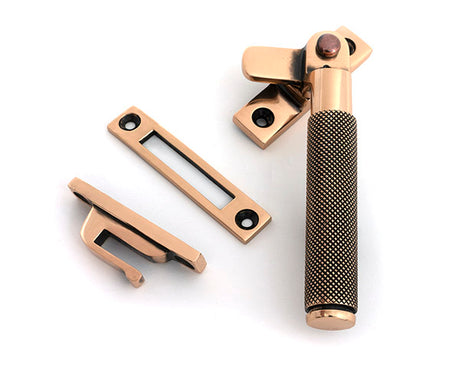 This is an image of From The Anvil - Polished Bronze Locking Brompton Fastener â€“ RH available to order from T.H. Wiggans Ironmongery in Kendal.