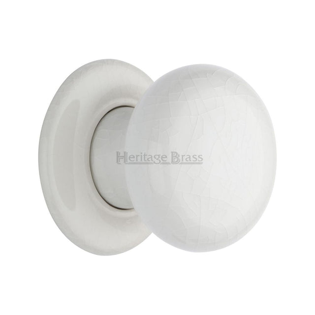 This is an image of a Heritage Brass - White Crackle Knob with Porcelain base, 7010-pr that is available to order from T.H Wiggans Ironmongery in Kendal.