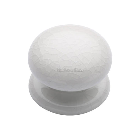 This is an image of a Heritage Brass - Cabinet Knob White Crackle 38mm with Porcelain base, 7038 that is available to order from T.H Wiggans Ironmongery in Kendal.