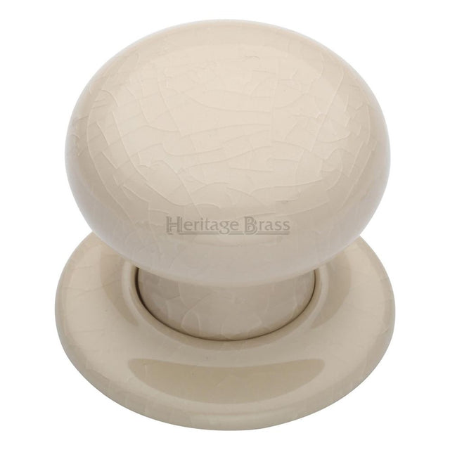 This is an image of a Heritage Brass - Cream Crackle Knob with Porcelain base, 8010-pr that is available to order from T.H Wiggans Ironmongery in Kendal.