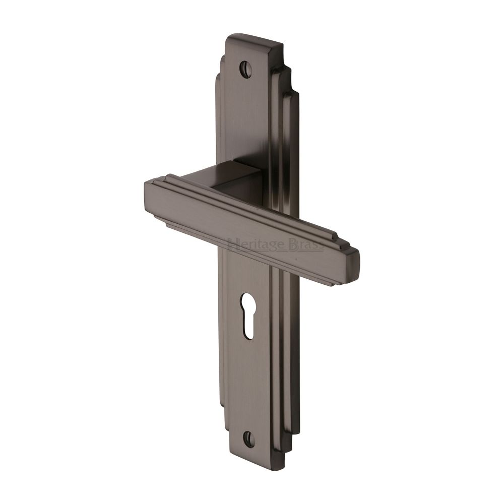 This is an image of a Heritage Brass - Door Handle Lever Lock Astoria Design Matt Bronze Finish, ast5900-mb that is available to order from T.H Wiggans Ironmongery in Kendal.