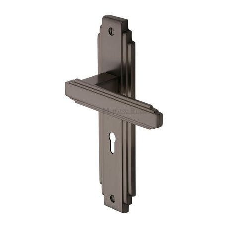 This is an image of a Heritage Brass - Door Handle Lever Lock Astoria Design Matt Bronze Finish, ast5900-mb that is available to order from T.H Wiggans Ironmongery in Kendal.