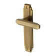 This is an image of a Heritage Brass - Door Handle Lever Latch Astoria Design Antique Brass Finish, ast5910-at that is available to order from T.H Wiggans Ironmongery in Kendal.