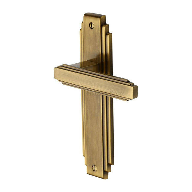 This is an image of a Heritage Brass - Door Handle Lever Latch Astoria Design Antique Brass Finish, ast5910-at that is available to order from T.H Wiggans Ironmongery in Kendal.