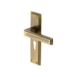 This is an image of a Heritage Brass - Door Handle Euro Profile Atlantis Design Antique Brass Finish, atl5748-at that is available to order from T.H Wiggans Ironmongery in Kendal.