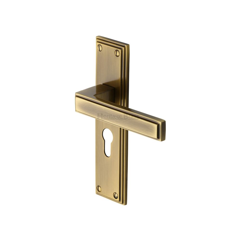 This is an image of a Heritage Brass - Door Handle Euro Profile Atlantis Design Antique Brass Finish, atl5748-at that is available to order from T.H Wiggans Ironmongery in Kendal.
