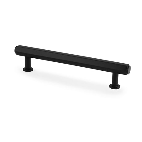 This is an image showing Alexander & Wilks - Vesper Hex T - Bar Cabinet Pull - Black - 128mm C/C aw830-128-bl available to order from T.H. Wiggans Ironmongery in Kendal, quick delivery and discounted prices.