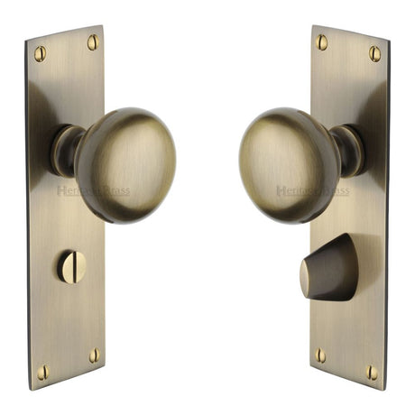 This is an image of a Heritage Brass - Mortice Knob on Bathroom Plate Balmoral Design Antique Brass Finis, bal8530-at that is available to order from T.H Wiggans Ironmongery in Kendal.