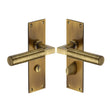 This is an image of a Heritage Brass - Door Handle for Bathroom Bauhaus Design Antique Brass Finish, bau7330-at that is available to order from T.H Wiggans Ironmongery in Kendal.