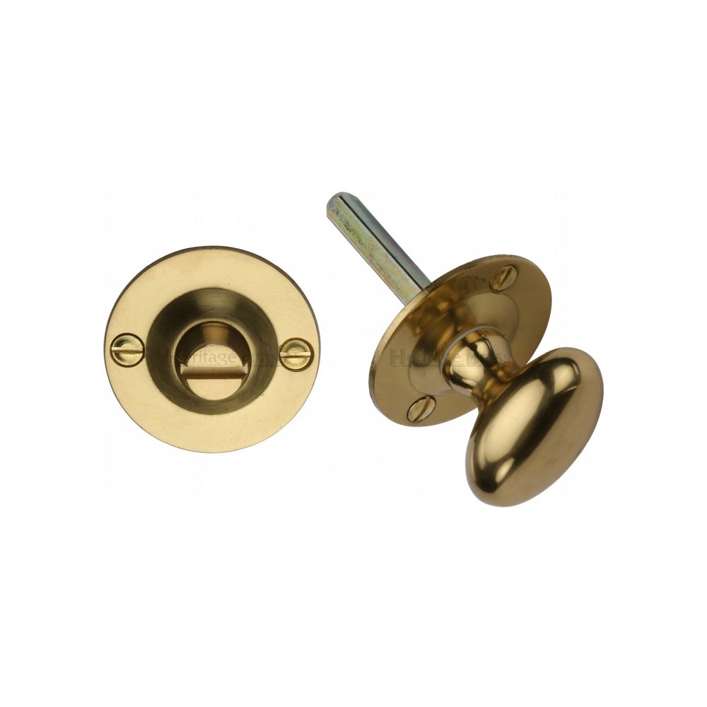 This is an image of a Heritage Brass - Oval turn with release Polished Brass Finish, bt15-pb that is available to order from T.H Wiggans Ironmongery in Kendal.