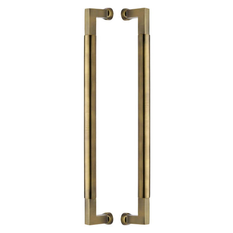 This is an image of a Heritage Brass - Door Pull Handle Bauhaus Design 483mm Antique Brass Finish, btb1312-483-at that is available to order from T.H Wiggans Ironmongery in Kendal.