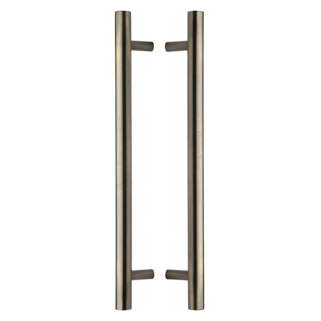 This is an image of a Heritage Brass - Back to Back Door Pull Handle Bar Design 457mm Antique Brass Finish, btb1361-457-at that is available to order from T.H Wiggans Ironmongery in Kendal.