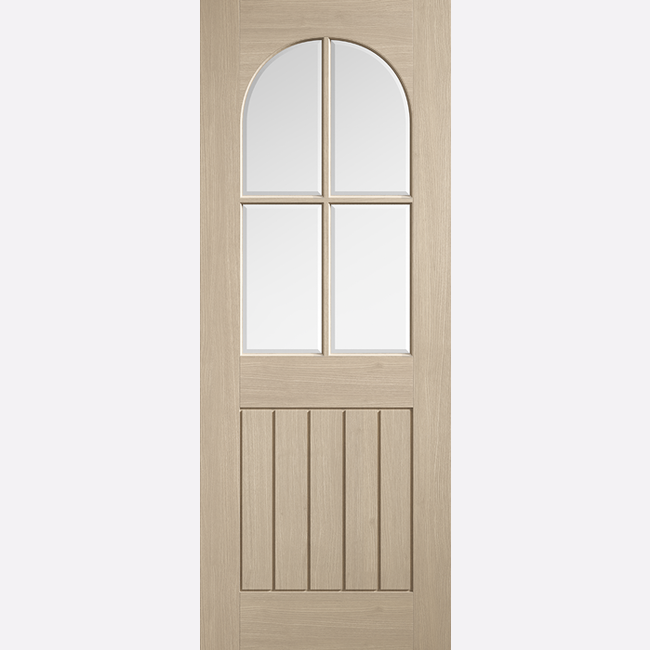 This is an image showing the LPD - Mexicano Arched Square Top Glazed Pre-finished Blonde Oak Doors Available to order from T.H. Wiggans Ironmongery in Kendal