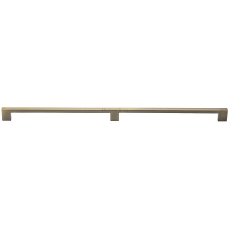 This is an image of a Heritage Brass - Cabinet Pull Metro Design 480mm CTC Antique Brass Finish, c0337-480-at that is available to order from T.H Wiggans Ironmongery in Kendal.