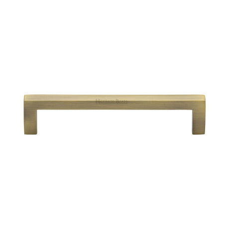 This is an image of a Heritage Brass - Cabinet Pull Square Metro Design 128mm CTC Antique Brass Finish, c0339-128-at that is available to order from T.H Wiggans Ironmongery in Kendal.