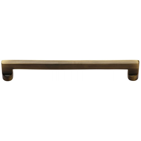 This is an image of a Heritage Brass - Cabinet Pull Apollo Design 203mm CTC Antique Brass Finish, c0345-203-at that is available to order from T.H Wiggans Ironmongery in Kendal.