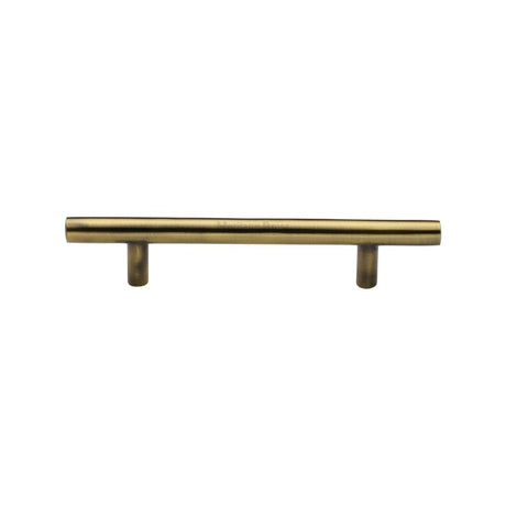 This is an image of a Heritage Brass - Cabinet Pull T-Bar Design 101mm CTC Antique Brass Finish, c0361-101-at that is available to order from T.H Wiggans Ironmongery in Kendal.