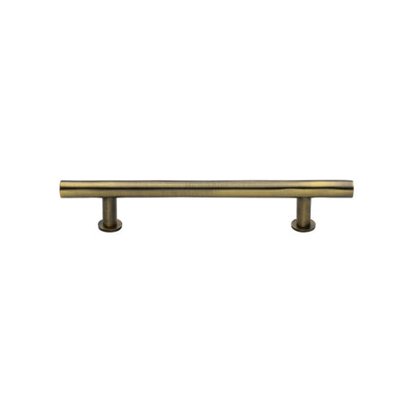 This is an image of a Heritage Brass - Cabinet Pull T-Bar Design with 16mm Rose 128mm CTC Antique Brass F, c0362-128-at that is available to order from T.H Wiggans Ironmongery in Kendal.