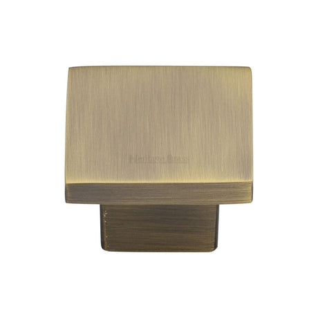This is an image of a Heritage Brass - Cabinet Knob Classic Square Design 32mm Antique Brass Finish, c1254-32-at that is available to order from T.H Wiggans Ironmongery in Kendal.